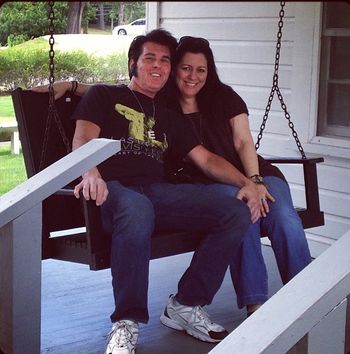 With my lovely wife Kathryn sitting on the swing on Elvis's porch at his birth place in Tupelo

