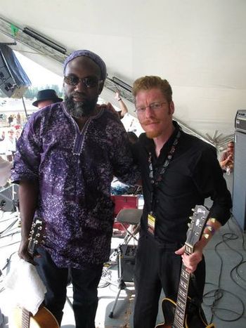 Playing a set with Corey Harris @ The Vancouver Island Festival.
