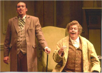 As the standing Dr Malatesta (Chris Carducci) sings "Bella siccome un angelo," Don Pasquale (Robert Samels) gets a little excited
