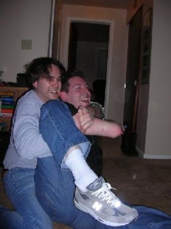 Robert and Chris wrestling
