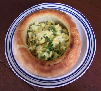 Scrambled Eggs with Chives in a Bread Bowl
