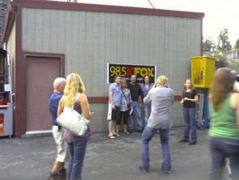 Rick Allen and Vivian Campbell from Def Leppard and bay area photographer Dave Lepori backstage at the Shoreline with some random fans Sept '09
