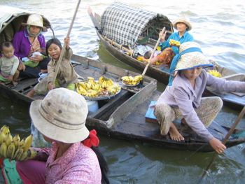 Vietnamese Boat Vendors, Outside Siem Reap, Cambodia.
