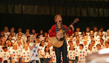 Trish singing "Thank a Soldier" with first graders
