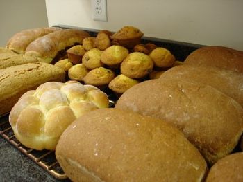 some of a Friday's bake:  rolls, muffins, oatmeal bread, pound cake, cinnamon-raisin bread
