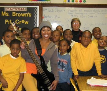 Miss Taj (front, with bass) and Bonni teach blues at Coles School, 2011
