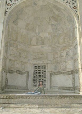 Bethany is shown dwarfed here by one of many ornate all marble alcoves that are cut out of the exterior walls of the Taj Mahal. (Photo by Jim Whirlow 2007)
