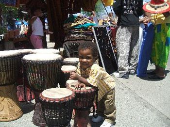 Lil Angelo picking a drum for his next gig
