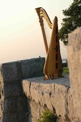 harp on a stone wall
