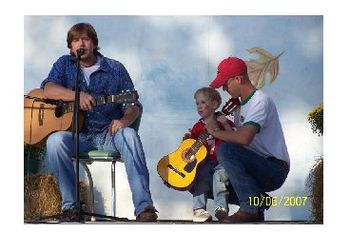 Ricky & Mason (with his dad) getting ready to sing.
