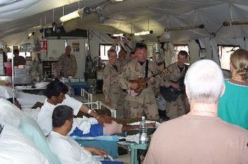 Performing for brave, injured Iraqi policemen, soldiers, and civilians at an American field hospital in Iraq.  God Bless our military medical teams - and God Bless the Iraqi people who risk everything
