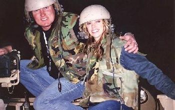 Jimmy and the Jolie drive a tank in Iraq - no kidding!
