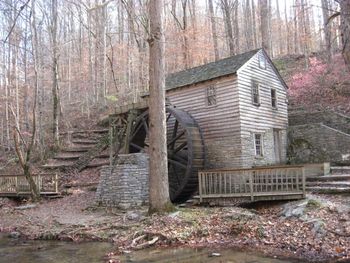 The old mill at Norris.  My Dad used to like to go fishing in Norris.  The mill doesn't operate any more.  When I was a little girl, we used to get our corn meal at this mill.  It was coarsely ground
