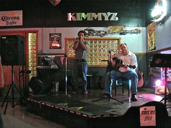 Steve Rush Playing harp with me at Kimmyz 7/22/10

