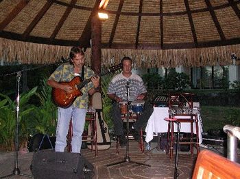 Michel at the Beachcomber Hotel, Tahiti with Godin Multiac Jazz guitar...
