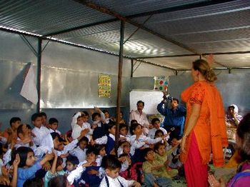 Children Singing in tent school
