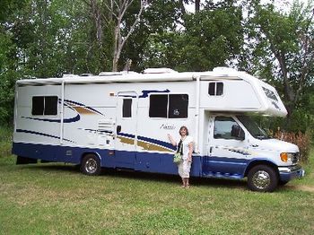 Linda with the new RV - it's a beauty!

