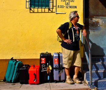 In Belize City, Deaton waits for a ride to the interior during the filming of "Lionfish - The Beautiful Outlaw" for PBS. Photo: Monica Gephart
