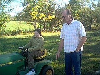 Troye's first mowing lesson...Summer 2005
