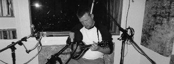 Recording mandolin tracks for "My One True Destination" project - Summer 2006 (Photo taken by my cousin Andy Reece)
