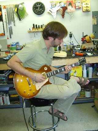 Justin gives his newly transformed and back-dated Les Paul a test run.  There's no denying, the guitar looks a million times better sans the ugly green inlays.
