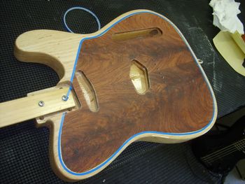 It was quickly apparent that the walnut inlay was a little squirrely around the edges.  I've got a fix for that.
