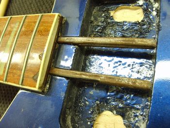 I removed the truss rods for inspection and rethreading, and took that opportunity to reglue the fretboard separation....
