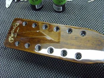 The headstock has received a new veneer, decal and fresh nitrocellulose lacquer finish.
