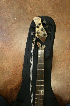 Yup, another broken headstock.  This time it's a $5,000 Pavel bass from Mississippi.
