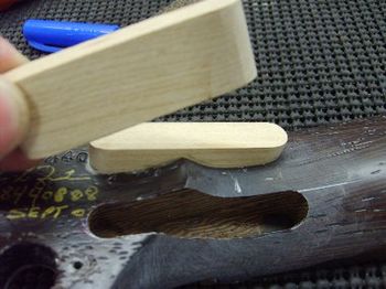 The maple stringers will bridge the repair and spread the torsional stress throughout a longer span of the neck-to-headstock transition.
