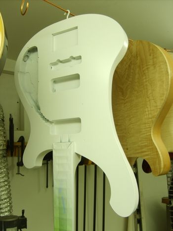The bass has been sprayed with white primer and will soon be ready for topcoats....
