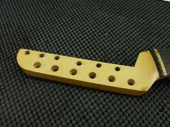 This '63 Fender Stratocaster neck had been horribly mutilated
