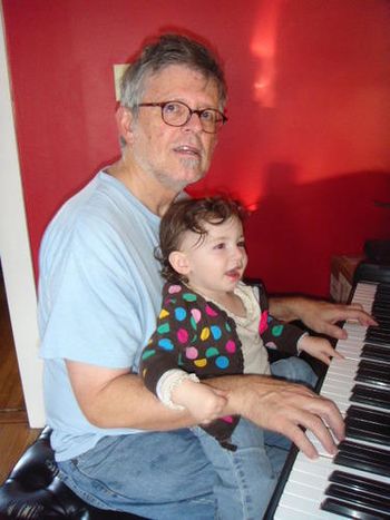Craig teaches his youngest piano student, Norah
