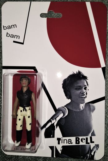 Bam Bam singer Tina Bell action figure by artist She-bop and She-bop Toys.
