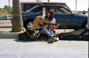 Playing for change in Ocean Beach CA.! The dog is singing...
