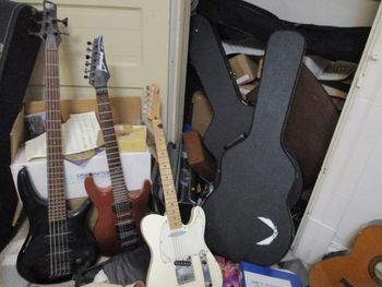 from left to right: Ibanez 5-string bass; Ibanez strat copy, Fender telecaster
