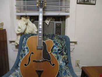 This guitar was built by Billy Cook of Peoria IL. It's designed after a Gibson Super 400. Beautiful instrument.
