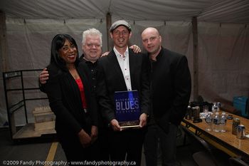 Steve with Miss Angel, Alec Fraser and Dave King, after winning the Mel Brown Blues Award. photo courtesy Stefan Myles
