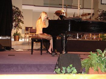 The evening takes on a more worshipful tone as Cathy plays and sings of the rest we find in God's Grace.
