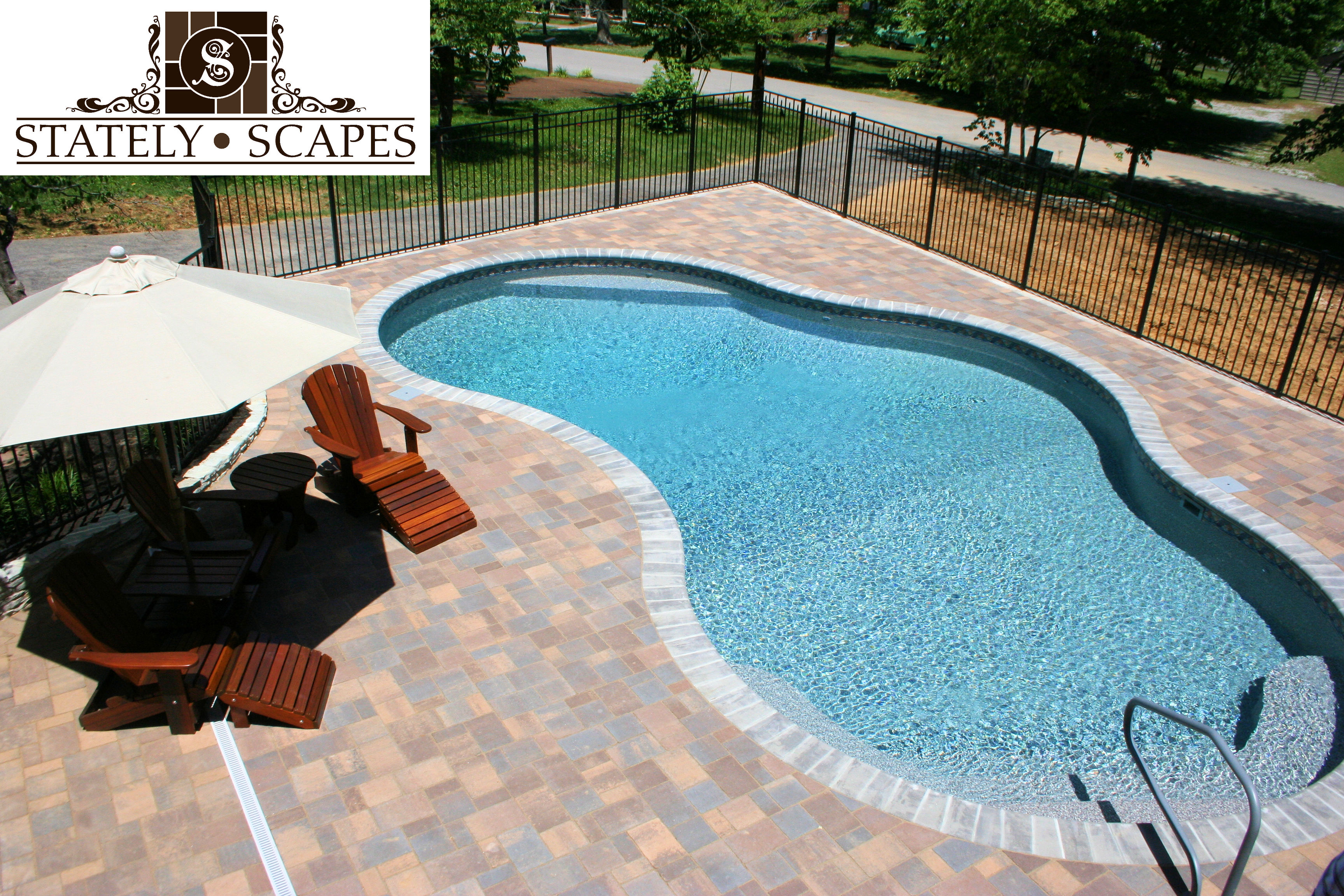 Matrix swimming pool with paver patio.