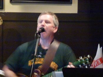 Jeff at Public House 7, in 7 Corners, Virginia, with green strings on his guitar for this St. Patrick's Day gig in 2013!
