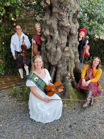 Members of the San Francisco Scottish Fiddlers get into the highland spirit for their concerts coming up in May. Credit: Deb McCaskey
