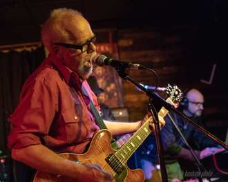 Jim Newton: Vocals and Guitar (Photo by Bob Hanham