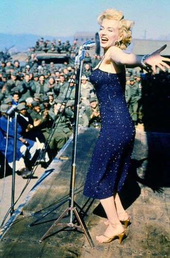 Marilyn Monroe singing and entertaining the troops in Korea in 1954.
