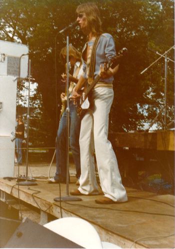John plays his new Gibson Thunderbird bass at this gig at Jumper's Hangout in 1977.
