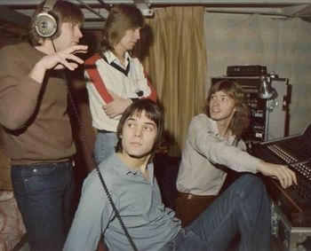 Skip wants "more cowbell" while listening to a demo mix at BFD in 1980.
