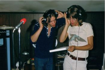 Jeff and John work on some backing vocals at La Cabane during the Bazooka sessions during the hot summer of 1975.
