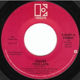 Label for "Too Late" with "Now and Then" on the flip side, the 1st US single release from the "Present Tense" LP in 1979 on Elektra Records.

