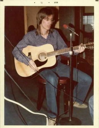 John plays some guitar at La Cabane in early 1975.
