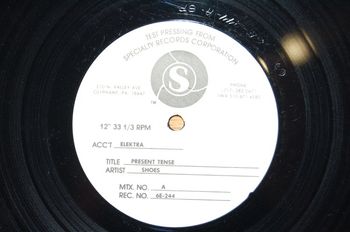 Label from Side A of the "Present Tense" test pressing.
